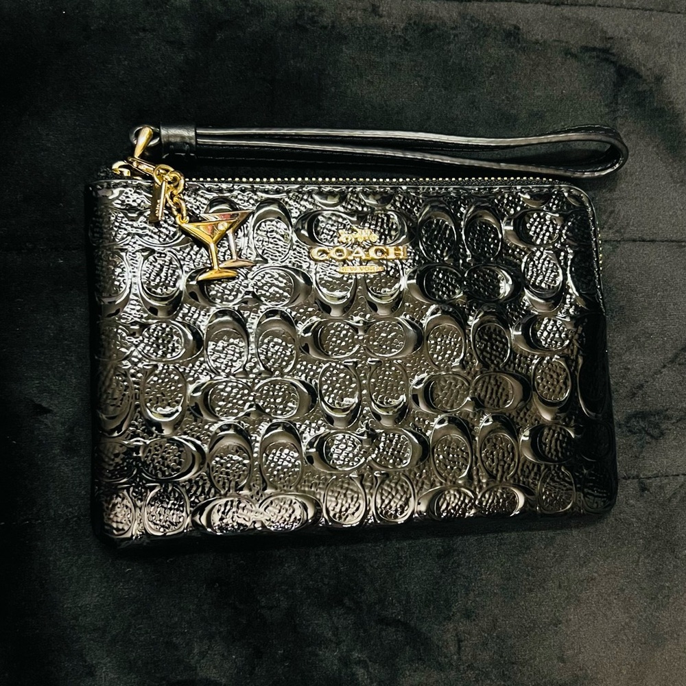 Coach Signature Logo Beige Embossed Patent Leather Corner Zip Wristlet.